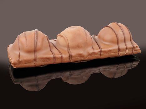 sweet chocolate bar, isolated with reflection, studio shot