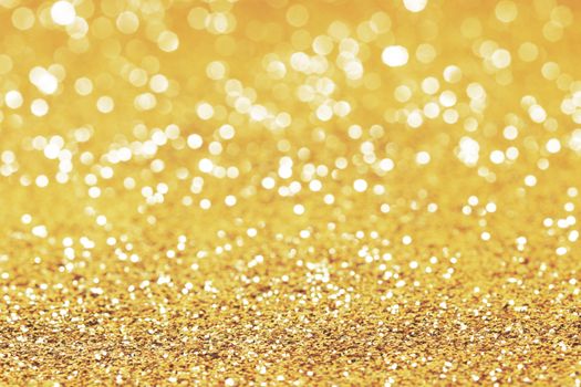 Abstract glitter bokeh holiday golden background