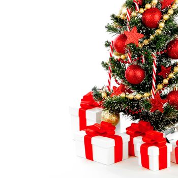 Beautiful decorated christmas tree isolated on white background