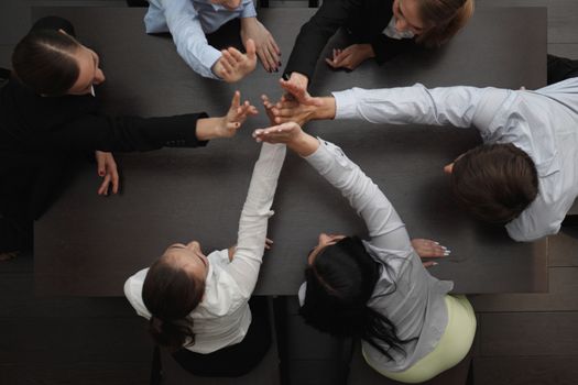 People with their hands together. Business team work concept