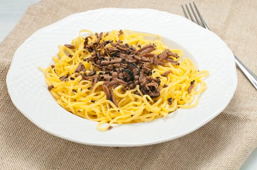 Pasta typical of Piedmont called tajarin with truffle, italy