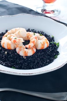 Black rice with prawns fresh, italy