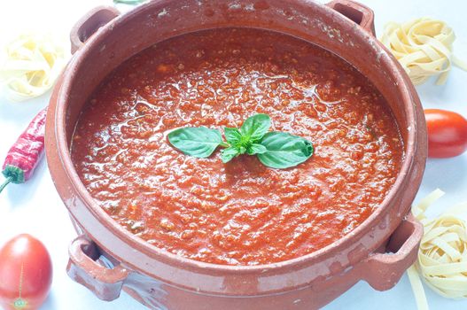 Tomato sauce in a clay pot, italy