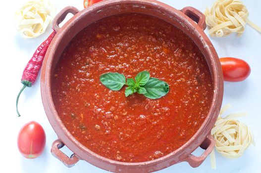 Tomato sauce in a clay pot, italy