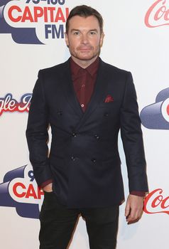 UNITED KINGDOM, London: Greg Burns attends the Capital FM Jingle Bell Ball at 02 Arena in London on December 6, 2015. 