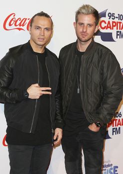 UNITED KINGDOM, London: Cameron Edwards (left) and Joe Lenzie of Sigma attend the Capital FM Jingle Bell Ball at 02 Arena in London on December 6, 2015. 