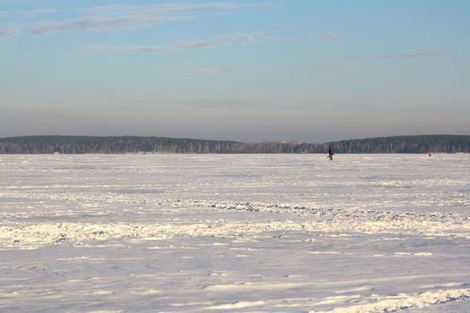 Fishermans on ice for fishing with equipments