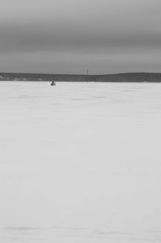 Fishermans on ice for fishing with equipments