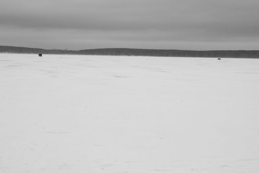 Fishermans on ice for fishing with equipments