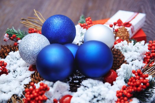 Christmas wreath and toys. Close-up horizontal photo