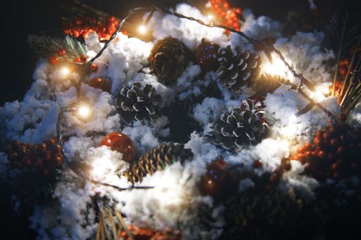 Christmas wreath and light. Close-up horizontal photo