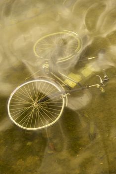 Abandoned bicycle on the bottom of a canal in the city of Copenhagen in Denmark.