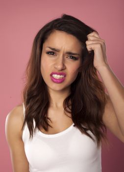 Beautiful model over pink background.