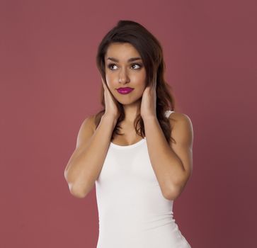 Beautiful model over pink background.