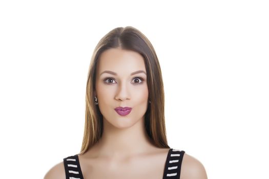 Casual young woman over a white background.