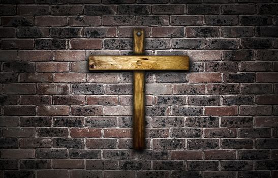 Wooden cross against a brick wall.