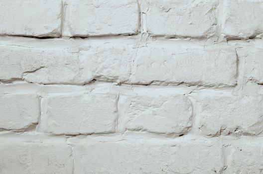 Background of White Grey Brick Wall Painted with White Mortar closeup