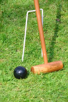 Croquet Mallet and black ball