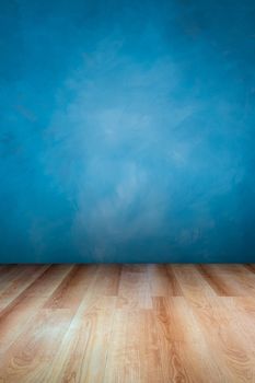Blue wall and wooden floor , use for background