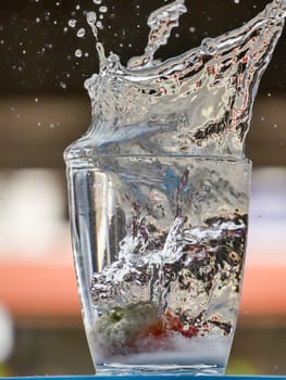 Strawberry Water splash in glass