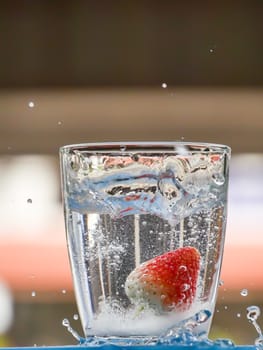 Strawberry Water splash in glass