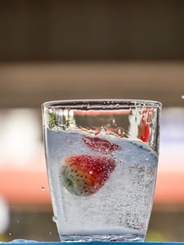 Strawberry Water splash in glass