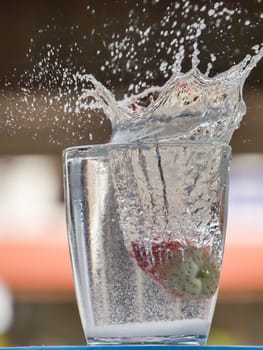 Strawberry Water splash in glass