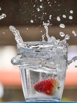 Strawberry Water splash in glass