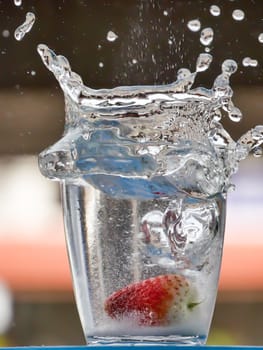 Strawberry Water splash in glass