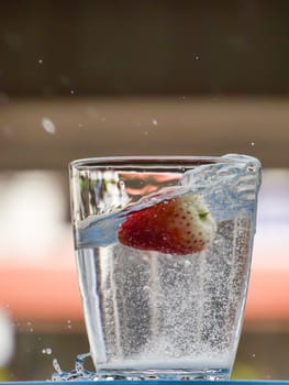 Strawberry Water splash in glass