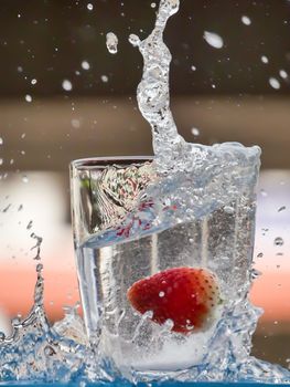 Strawberry Water splash in glass