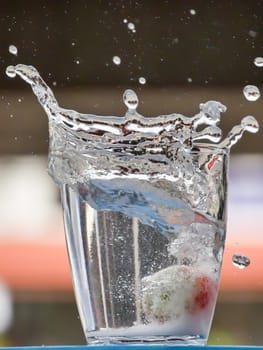 Strawberry Water splash in glass