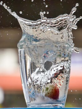 Strawberry Water splash in glass