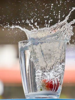 Strawberry Water splash in glass