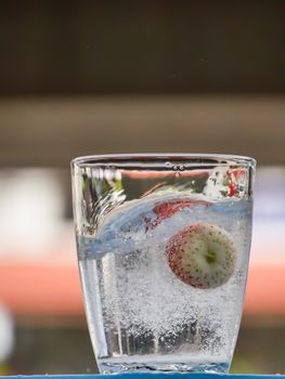 Strawberry Water splash in glass