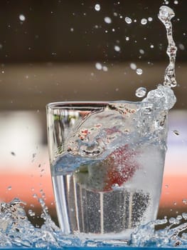 Strawberry Water splash in glass