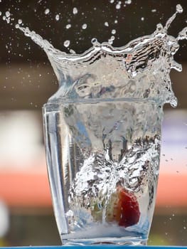 Strawberry Water splash in glass