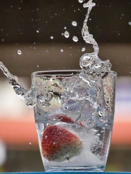 Strawberry Water splash in glass
