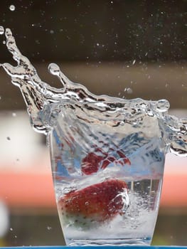 Strawberry Water splash in glass