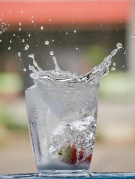 Strawberry Water splash in glass