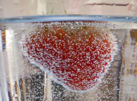 Strawberry Water splash in glass