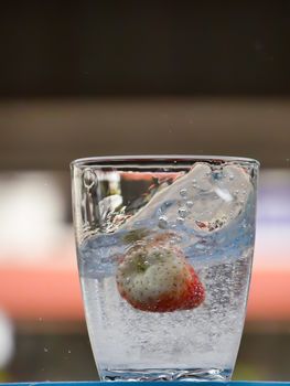 Strawberry Water splash in glass