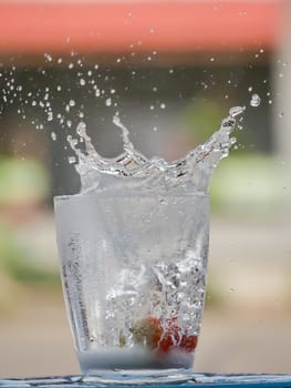 Strawberry Water splash in glass