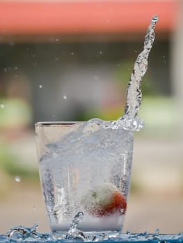 Strawberry Water splash in glass