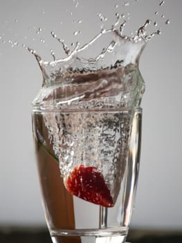 Strawberry Water splash in glass