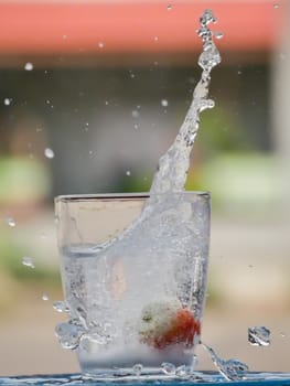 Strawberry Water splash in glass