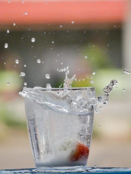 Strawberry Water splash in glass