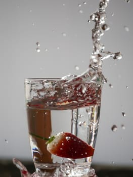 Strawberry Water splash in glass
