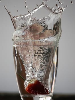Strawberry Water splash in glass