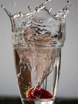 Strawberry Water splash in glass